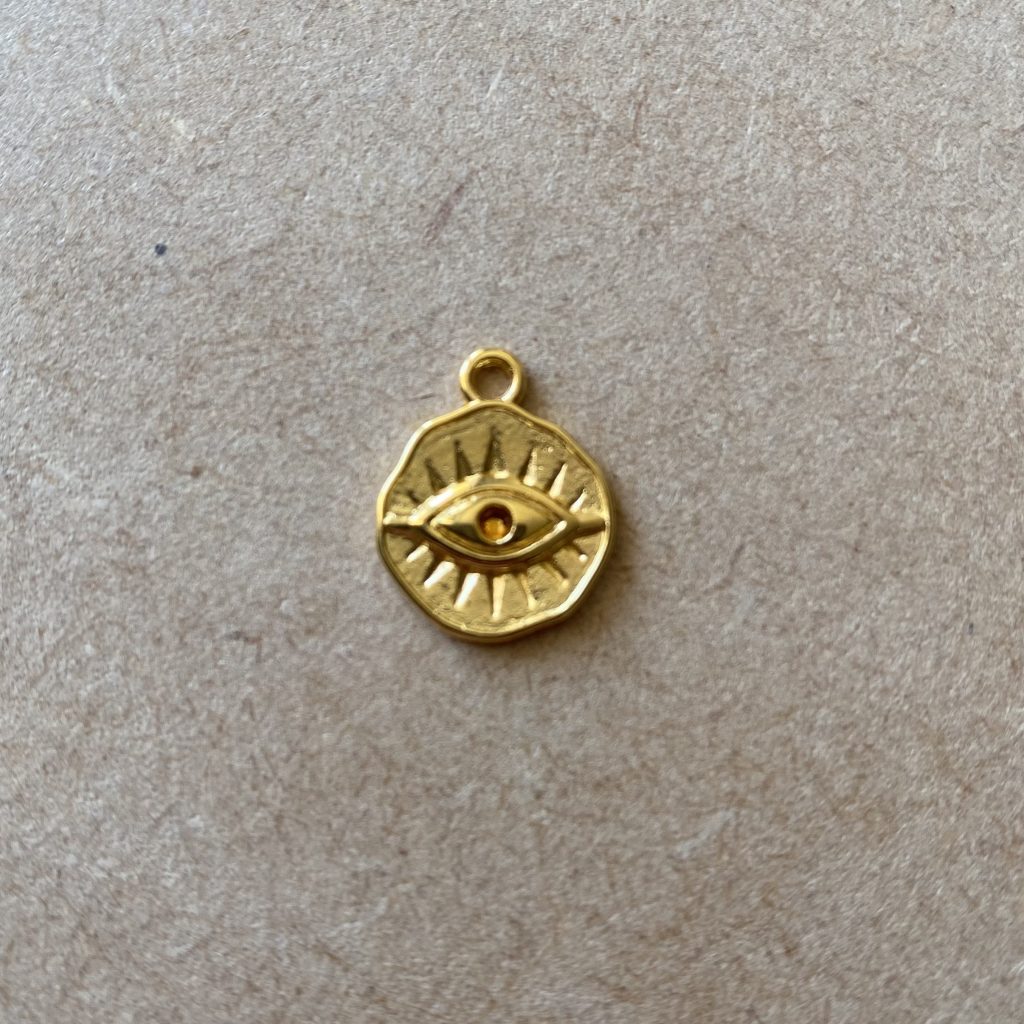 Bibliothèque - Nos Apprêts - Oeil de protection doré - les pierres de tao - bijoux - fait main - lithothérapie - pierres fines - pierres naturelles - boutique - france